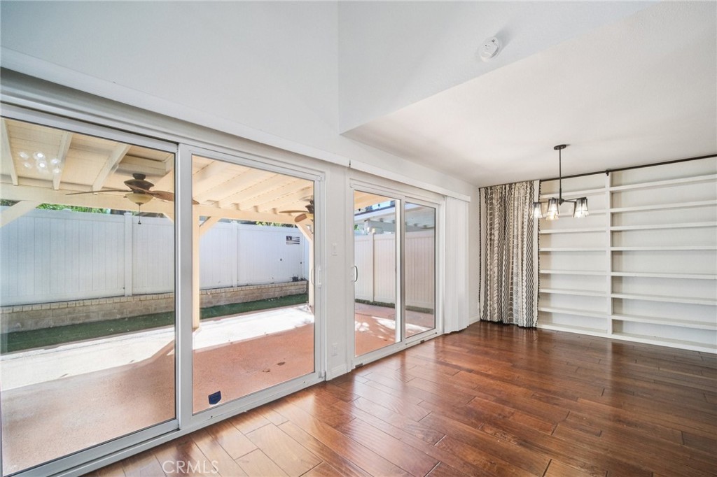 22810 Rio Chico Drive Valencia, CA 91354 - Photo 16 of 60 a view of empty room with wooden floor