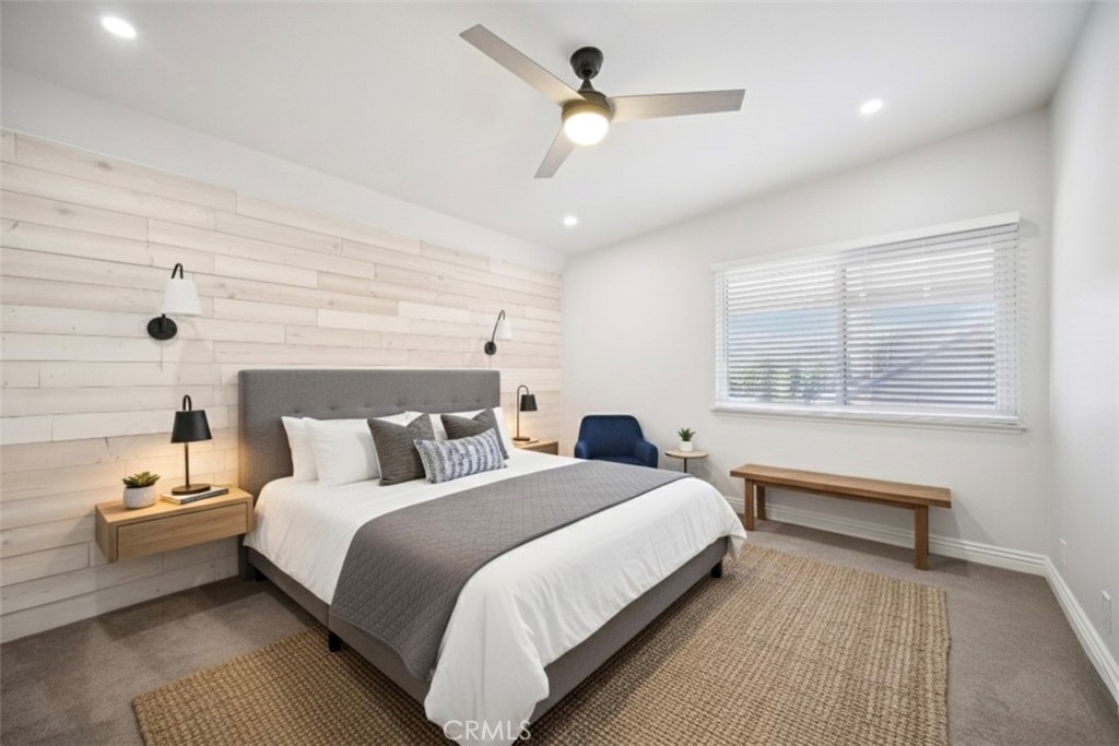 22810 Rio Chico Drive Valencia, CA 91354 - Photo 37 of 60 a bedroom with a bed and a large window