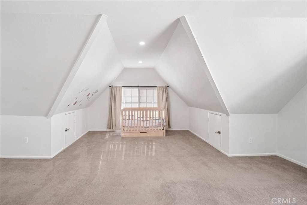 22810 Rio Chico Drive Valencia, CA 91354 - Photo 43 of 60 an empty room with windows