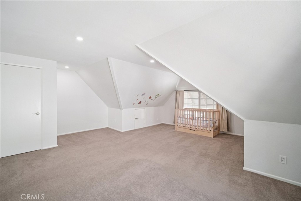 22810 Rio Chico Drive Valencia, CA 91354 - Photo 45 of 60 a view of an empty room with windows