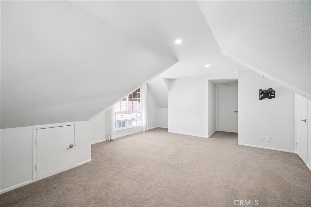 22810 Rio Chico Drive Valencia, CA 91354 - Photo 47 of 60 a view of an empty room with a window