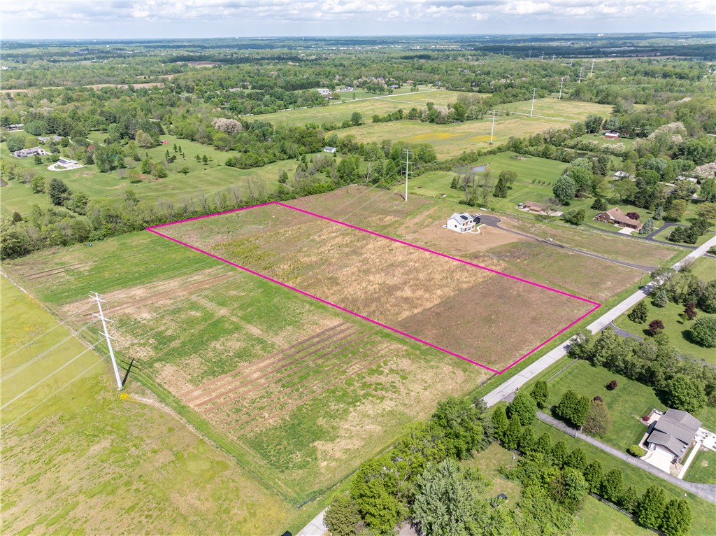 1095 Spring Valley-Alpha Road Xenia, OH 45385 - Photo 5 of 5 This aerial view showcases a spacious lot, offering ample room for a dream home amidst natural surroundings.