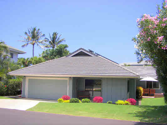 a front view of house with an outdoor space
