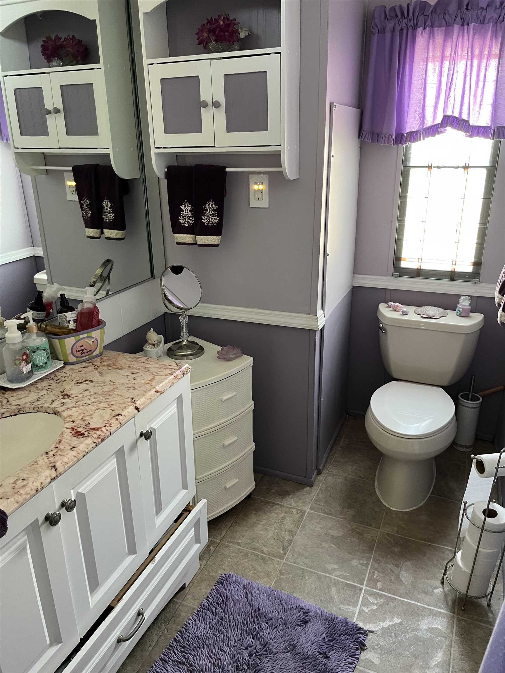 301 Grande Rio Grande, NJ 08242 - Photo 16 of 23 a bathroom with a toilet a sink and a window