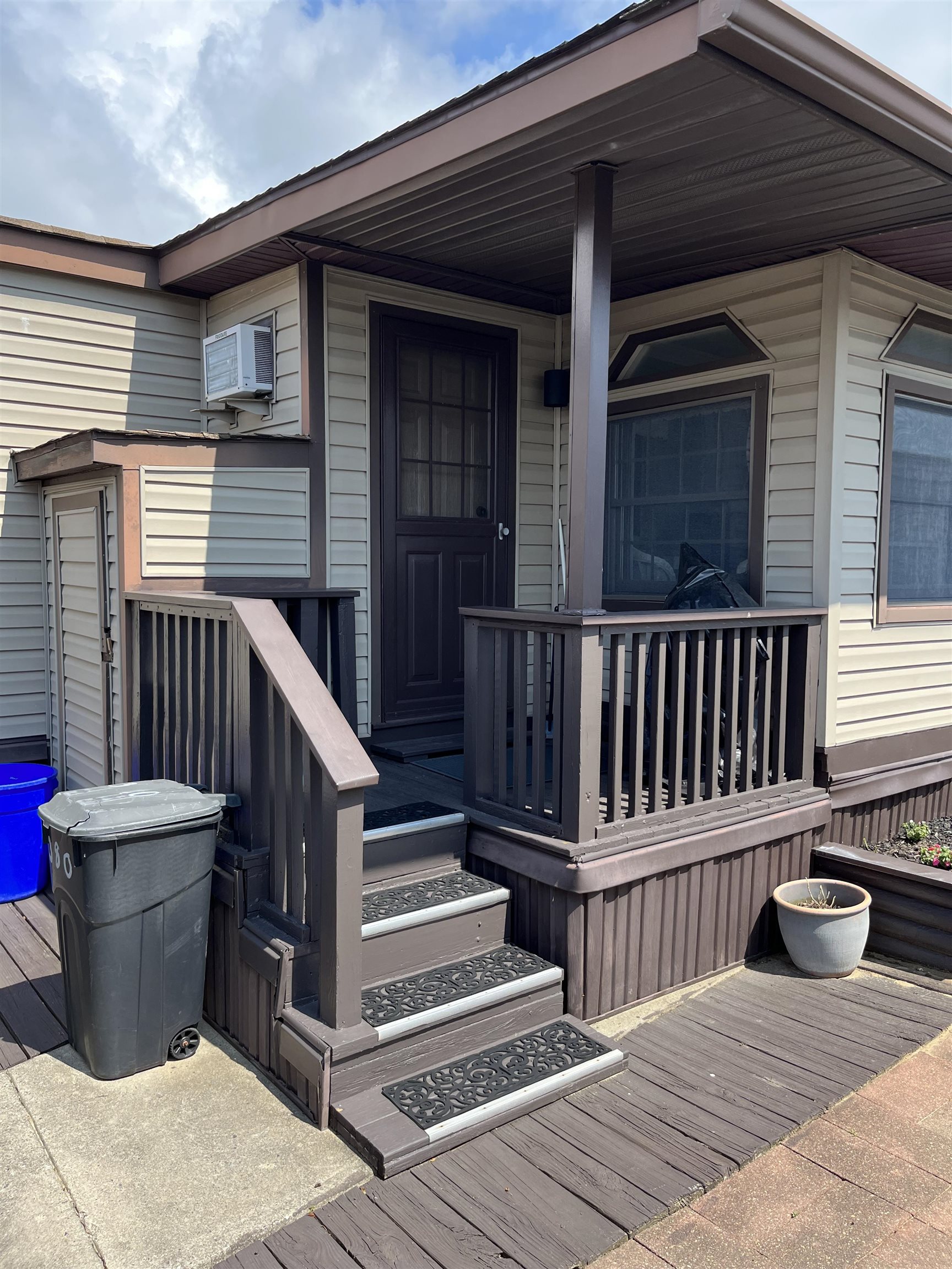 301 Grande Rio Grande, NJ 08242 - Photo 21 of 23 a view of a balcony with two chairs and wooden floor