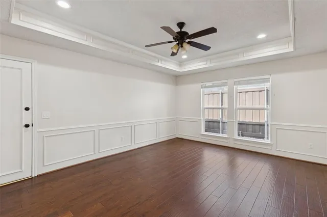 a bedroom with bed and a window