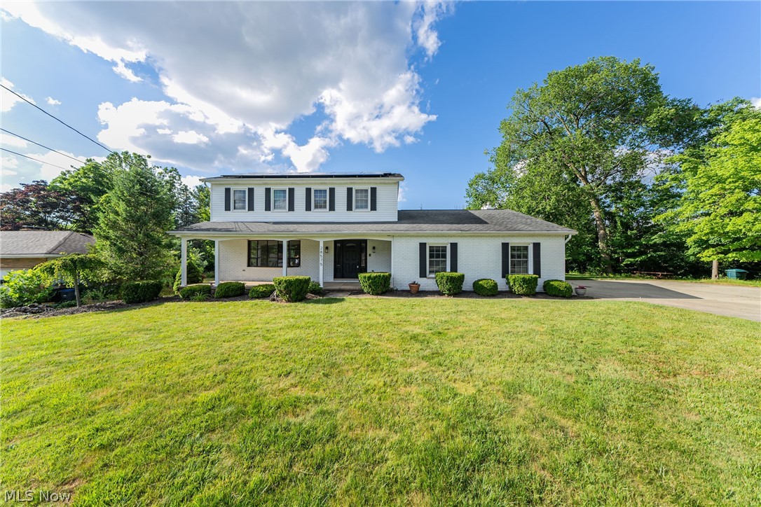 28575 Cannon Road Solon, OH 44139 - Photo 1 of 36 View of front of home featuring a porch and a front lawn