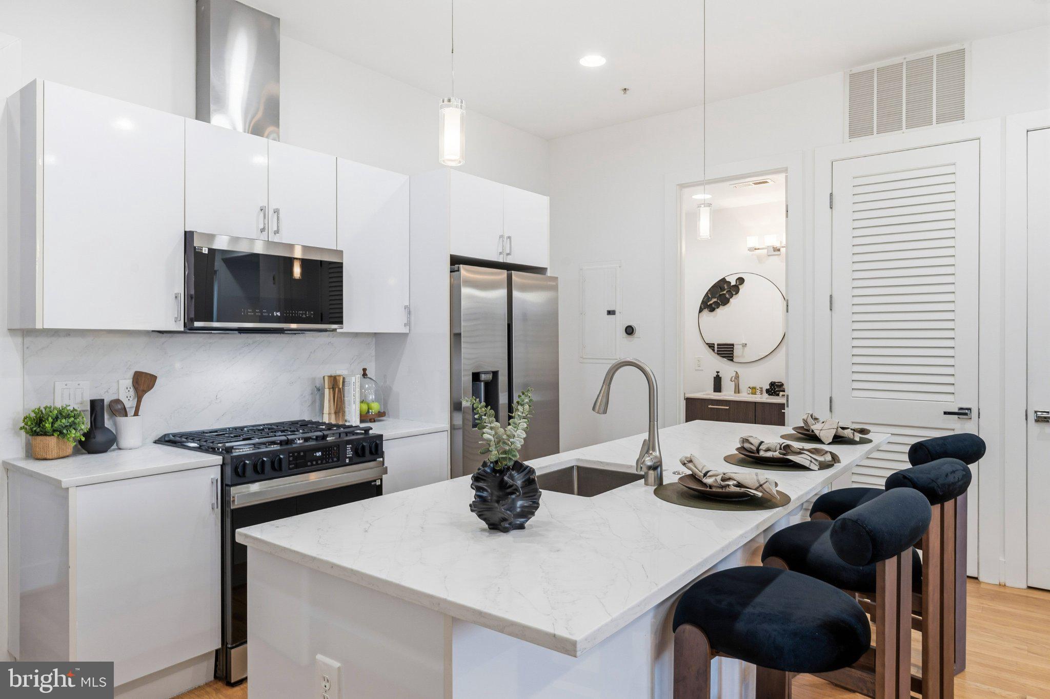 Sleek modern kitchen with elegant finishes.