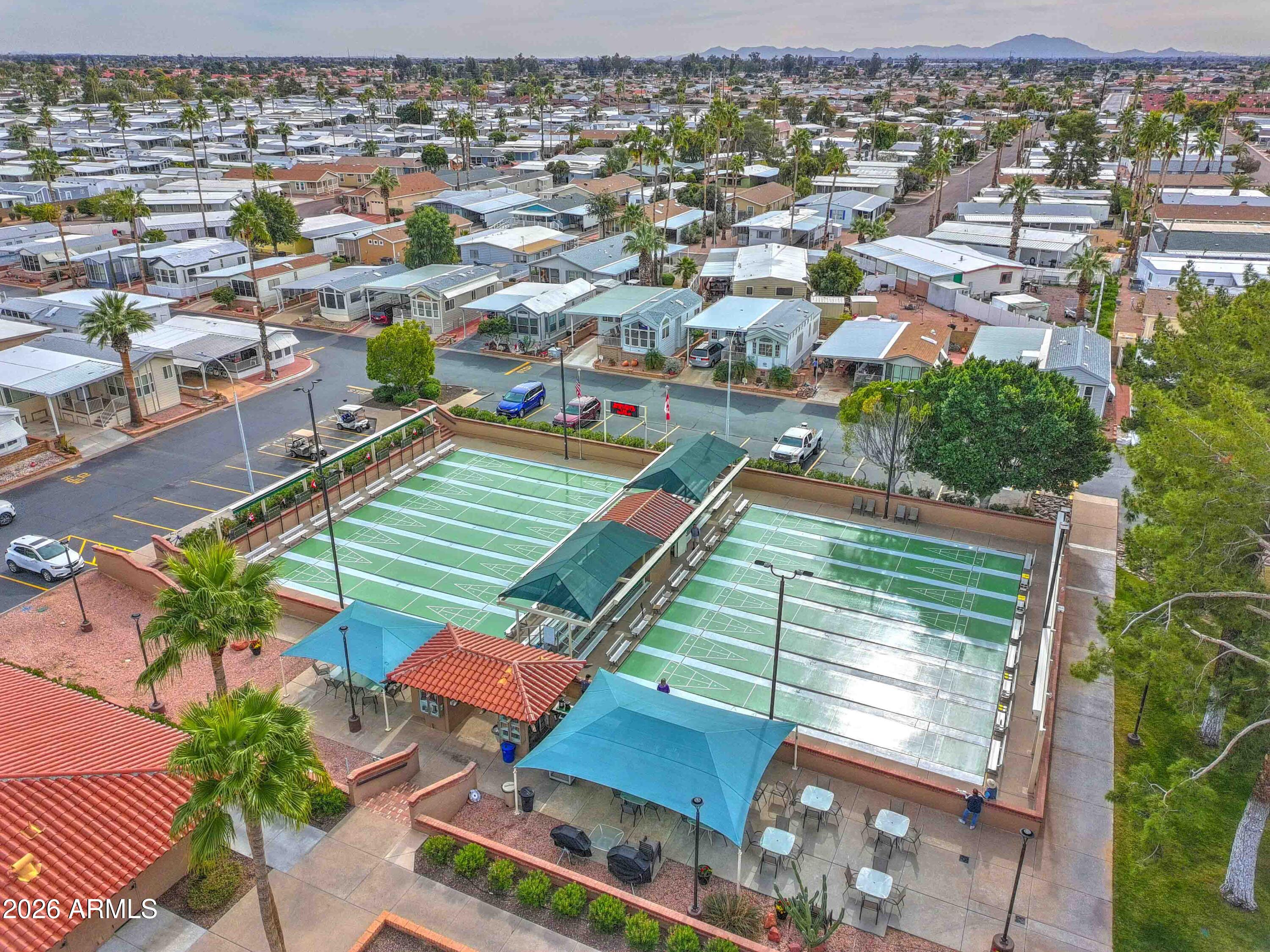 111 South Greenfield Road, Unit 520 Mesa, AZ 85206 - Photo 19 of 28 an aerial view of a houses with a yard