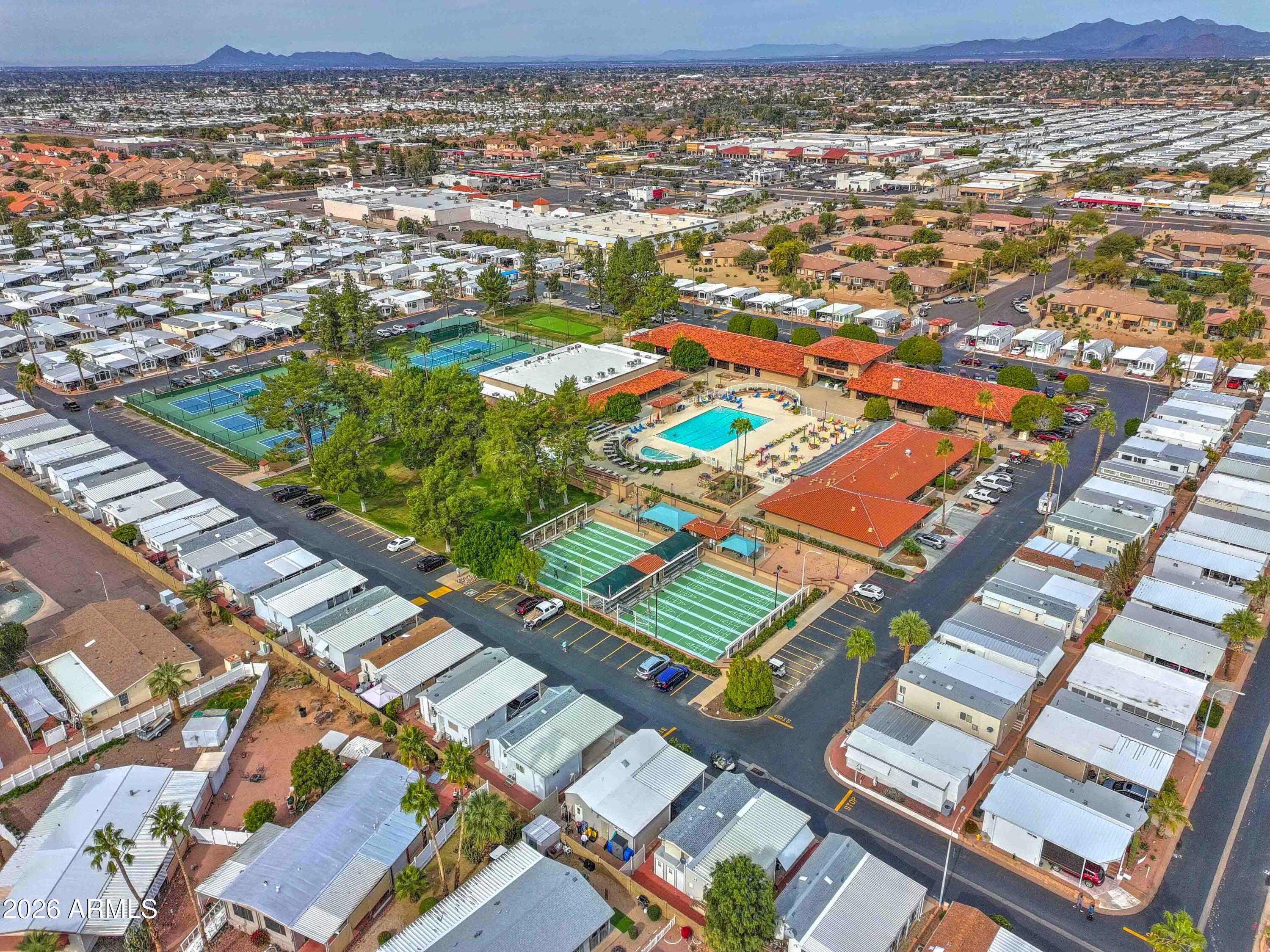 111 South Greenfield Road, Unit 520 Mesa, AZ 85206 - Photo 23 of 28 an aerial view of residential houses with outdoor space