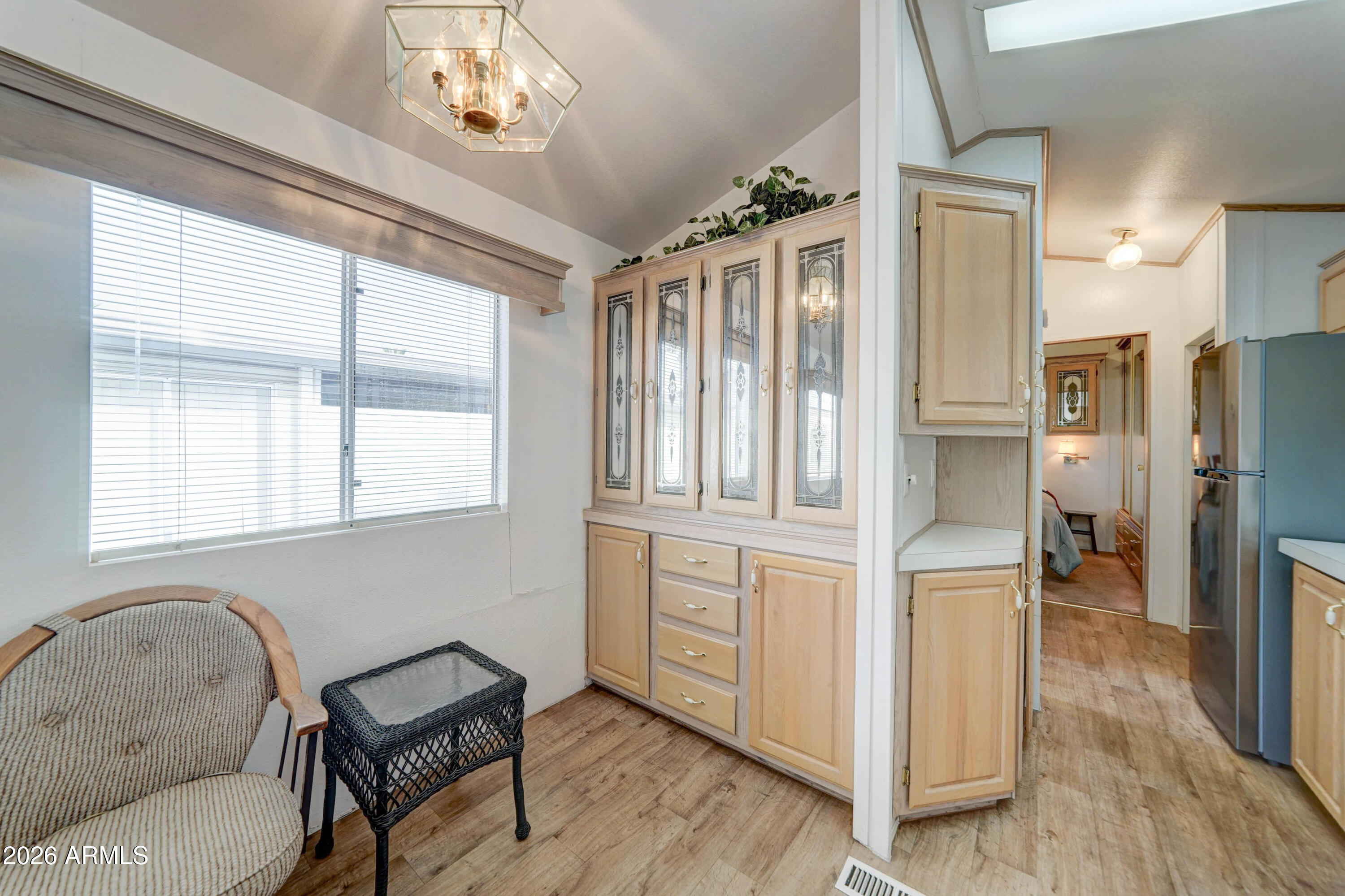111 South Greenfield Road, Unit 520 Mesa, AZ 85206 - Photo 8 of 28 a kitchen with stainless steel appliances granite countertop a refrigerator and a stove top oven