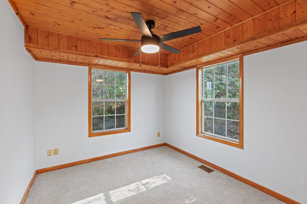 144 River Watch Terrace Murphy, NC 28906 - Photo 17 of 60 a view of an empty room with a window