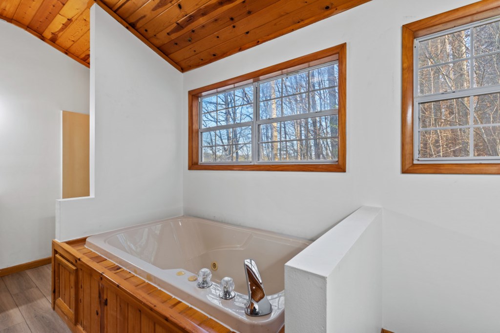 144 River Watch Terrace Murphy, NC 28906 - Photo 23 of 60 a bath room with a bath tub and a shower
