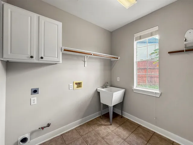 a view of staircase with white walls