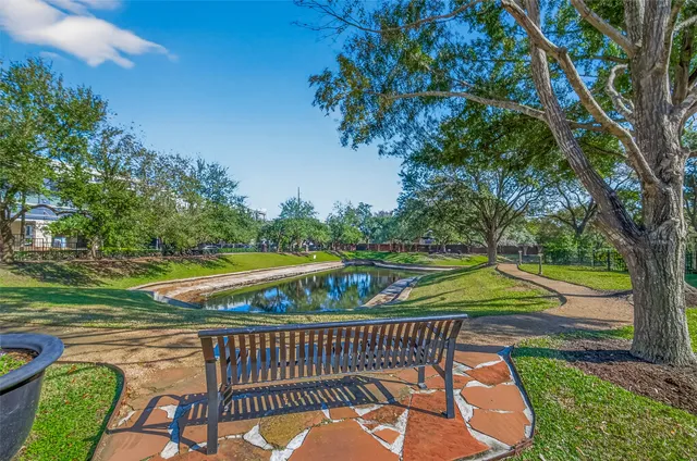 a view of a street with houses on both side