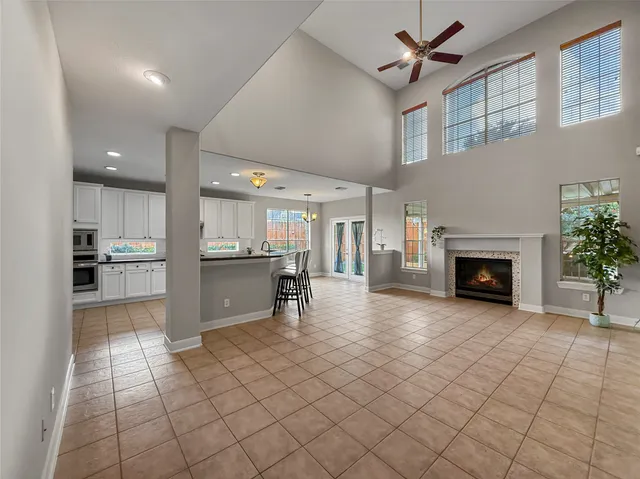 a view of a kitchen with furniture and a fireplace