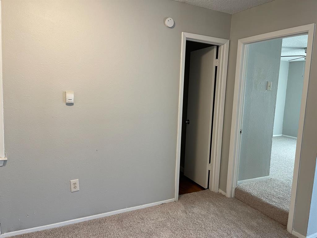 9696 Walnut Street, Unit 1206 Dallas, TX 75243 - Photo 9 of 13 a view of an empty room