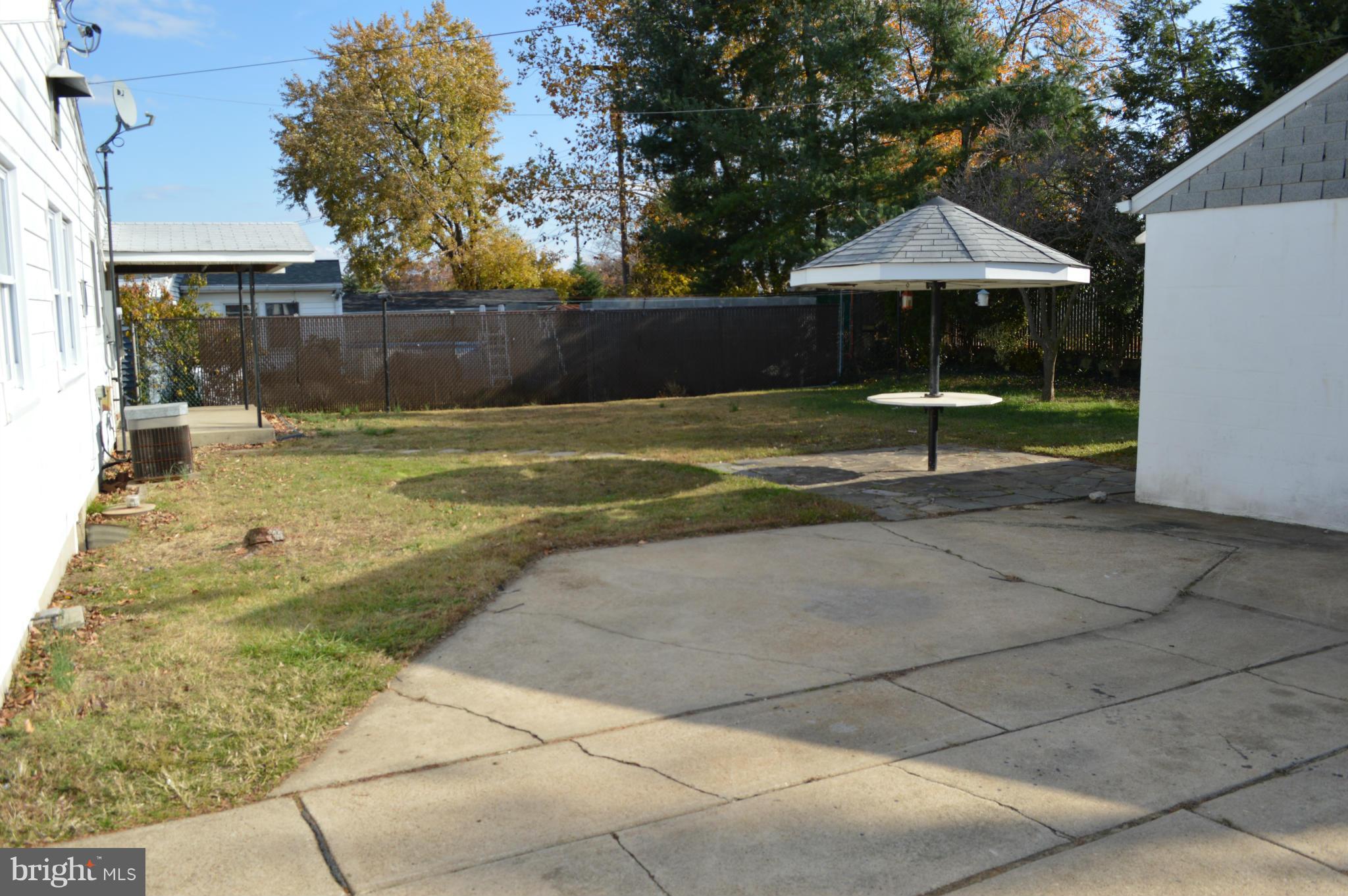 7605 Merritt Point Road Baltimore, MD 21222 - Photo 4 of 13 a view of a backyard