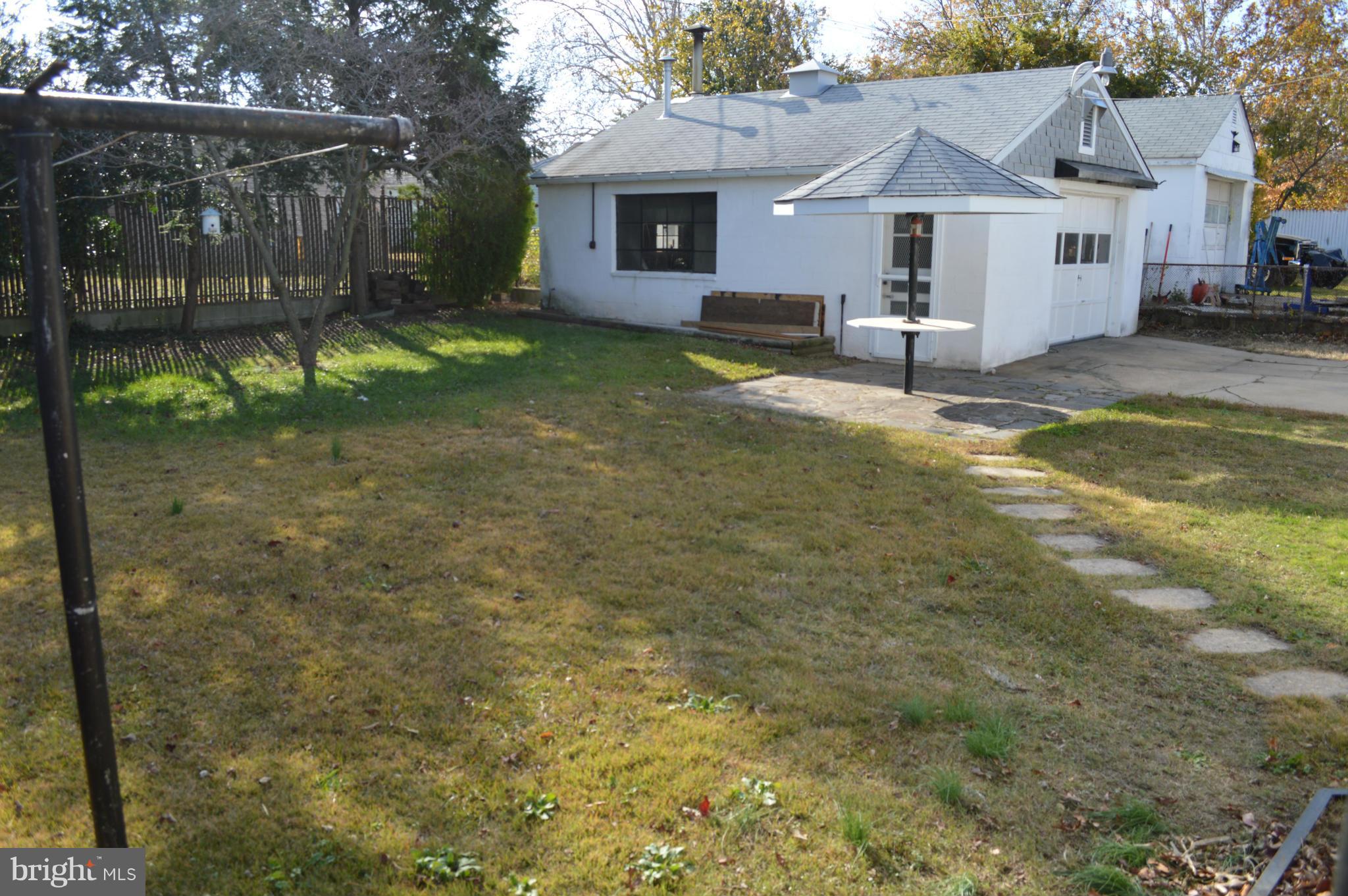 7605 Merritt Point Road Baltimore, MD 21222 - Photo 5 of 13 a view of a house with a yard
