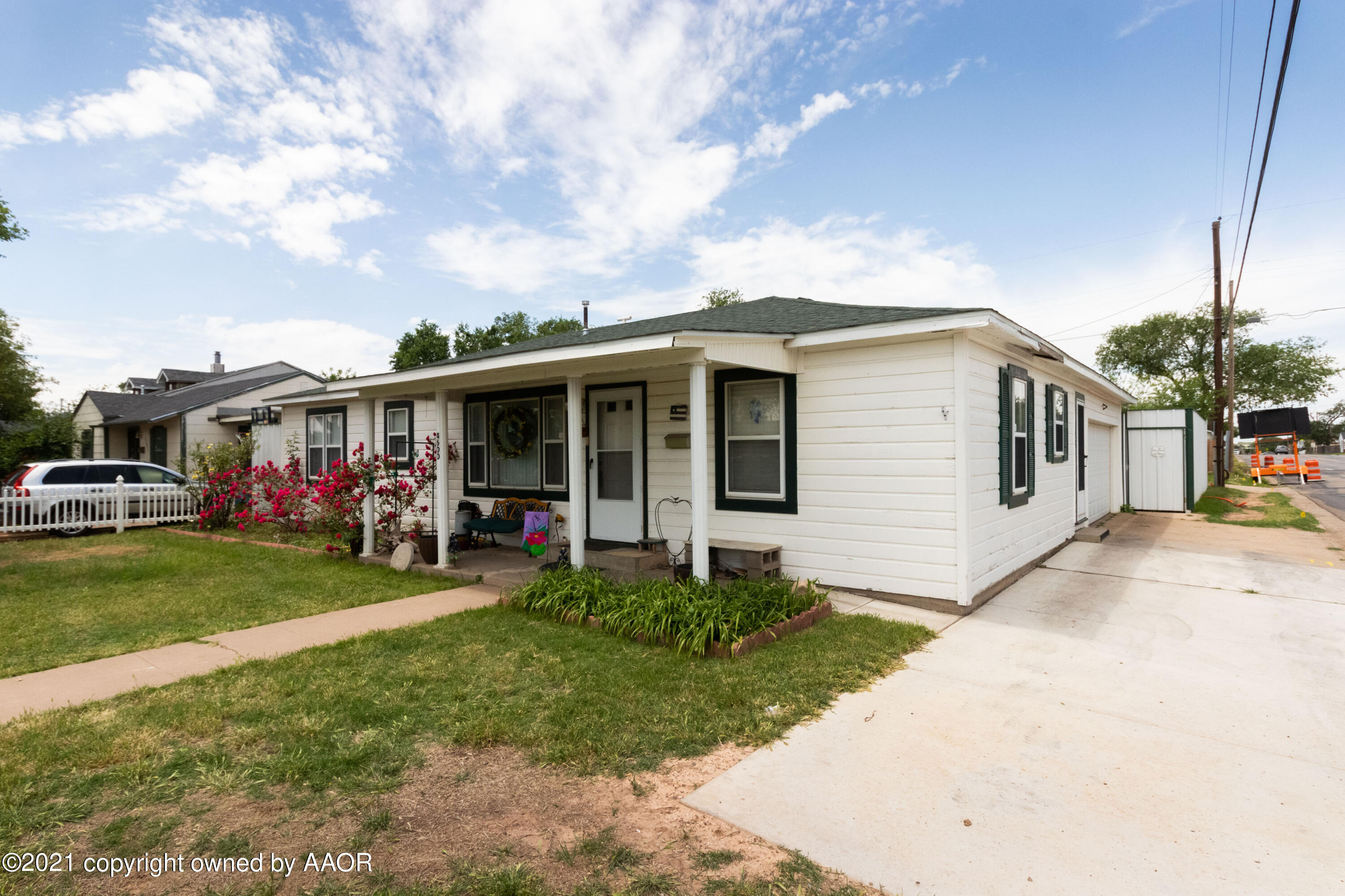 4600 Parker Street Amarillo, TX 79110 - Photo 2 of 28 a view of a house with a yard