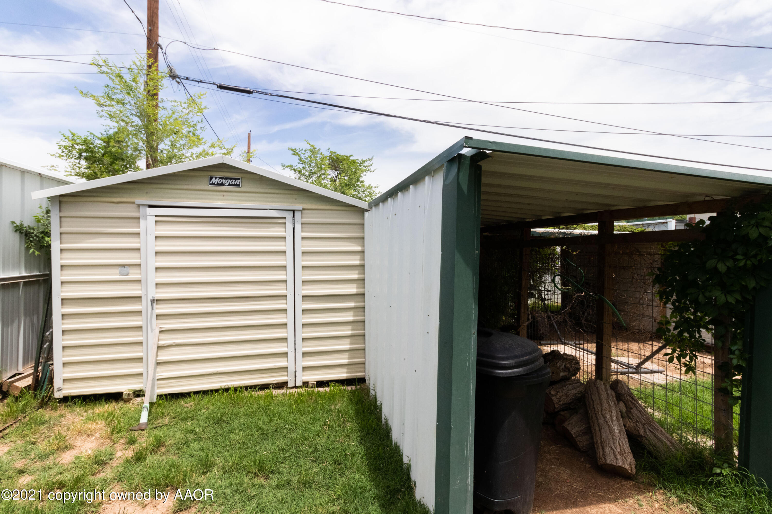 4600 Parker Street Amarillo, TX 79110 - Photo 28 of 28 a view of a porch with a hanging chair