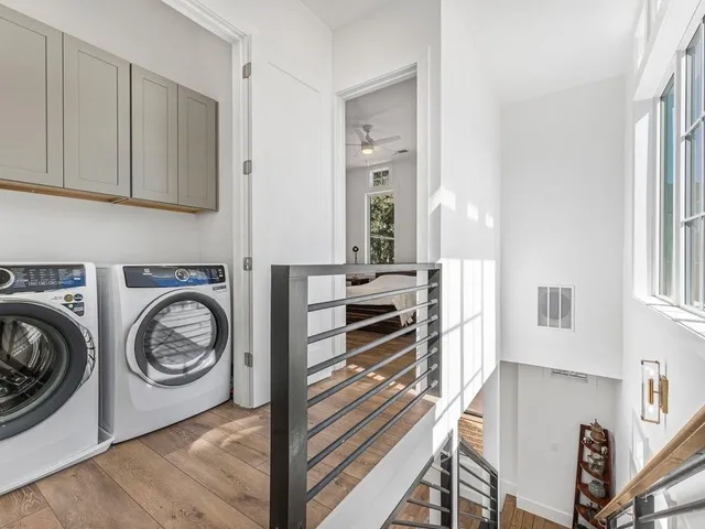 a view of a kitchen with washer and dryer