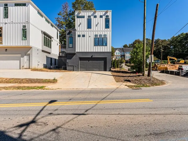 a view of a house with a swimming pool