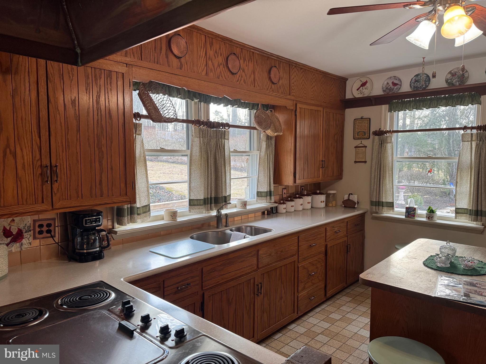 30 Hollow Road Telford, PA 18969 - Photo 9 of 38 a kitchen with a sink stove and cabinets
