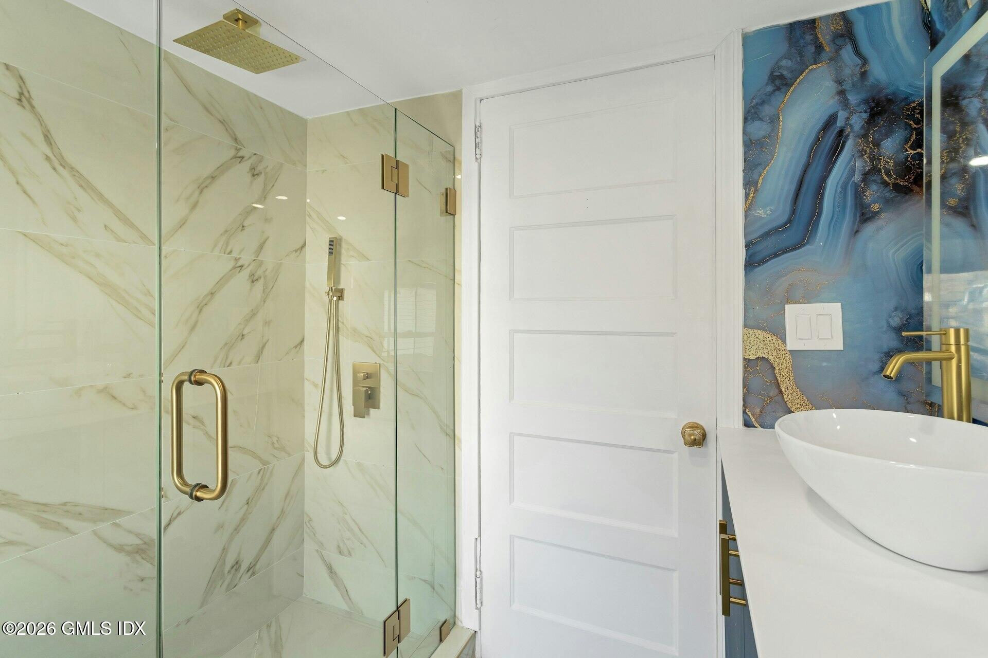71 Prospect Street, Unit 2 Greenwich, CT 06830 - Photo 16 of 17 a bathroom with a shower and a sink