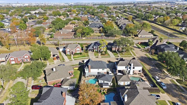 an aerial view of residential building with outdoor space