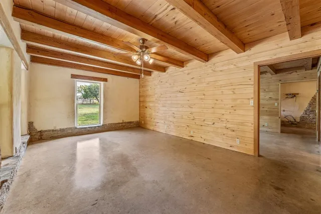 a view of outdoor space with wooden floor and seating