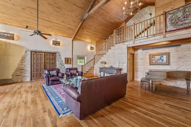 a living room with furniture and a table