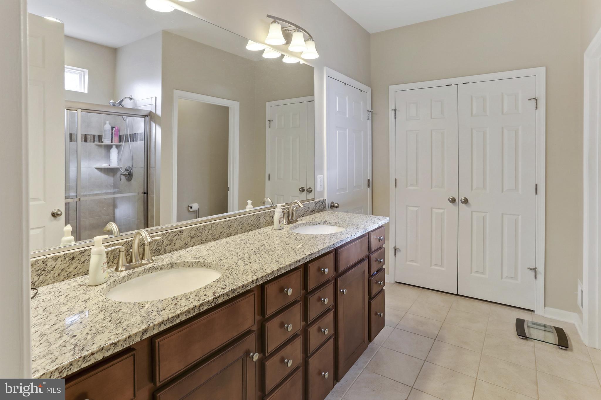 128 Sparkling Brook Road Ranson, WV 25438 - Photo 25 of 57 Upgraded. Spacious bathroom with elegant finishes.