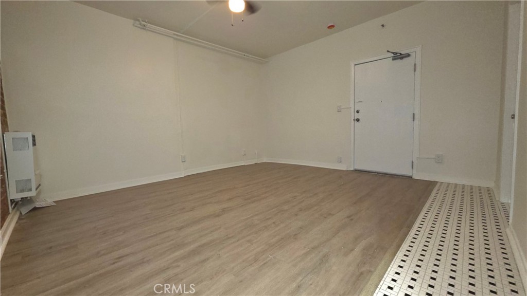 3408 West Sunset, Unit 106 Los Angeles, CA 90026 - Photo 3 of 5 wooden floor in a room