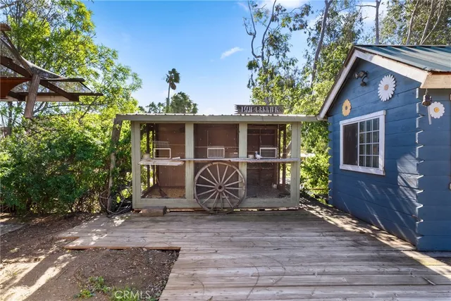 a view of a house with a yard and plants