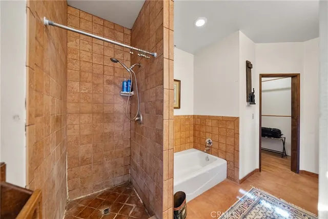 a living room with lots of furniture and a chandelier