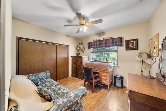 a view of a patio with table and chairs and potted plants