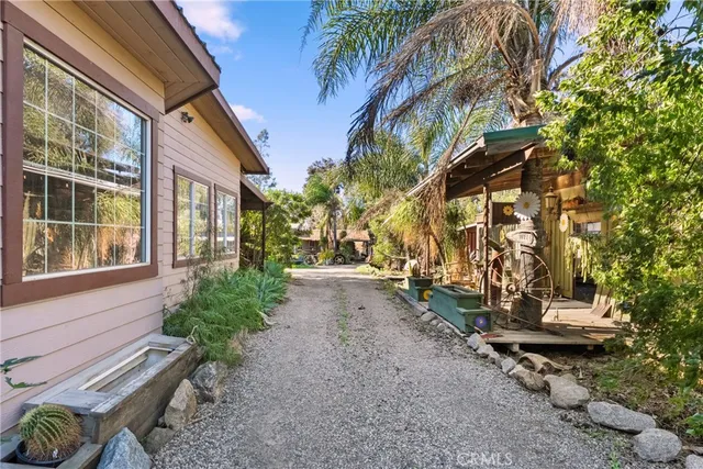 an aerial view of houses with outdoor space