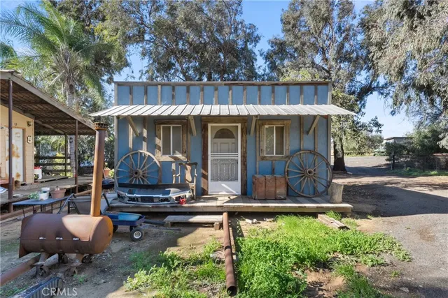 swimming pool view with a seating space