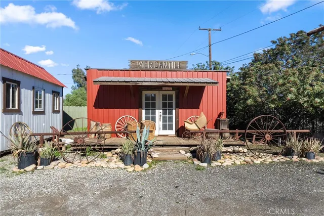 a front view of a house with patio