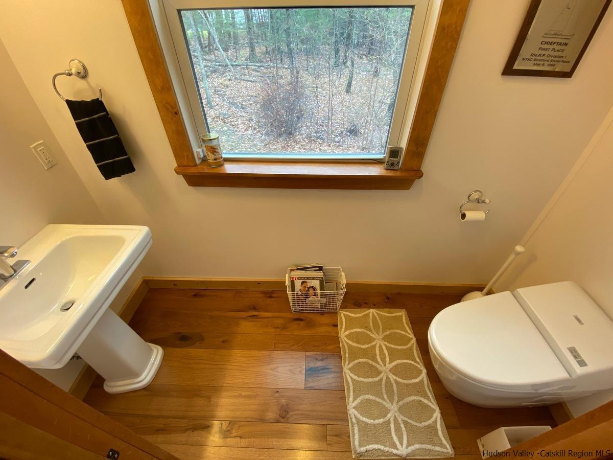 56 Ridge Road Shokan, NY 12481 - Photo 21 of 34 a bathroom with a toilet and a sink