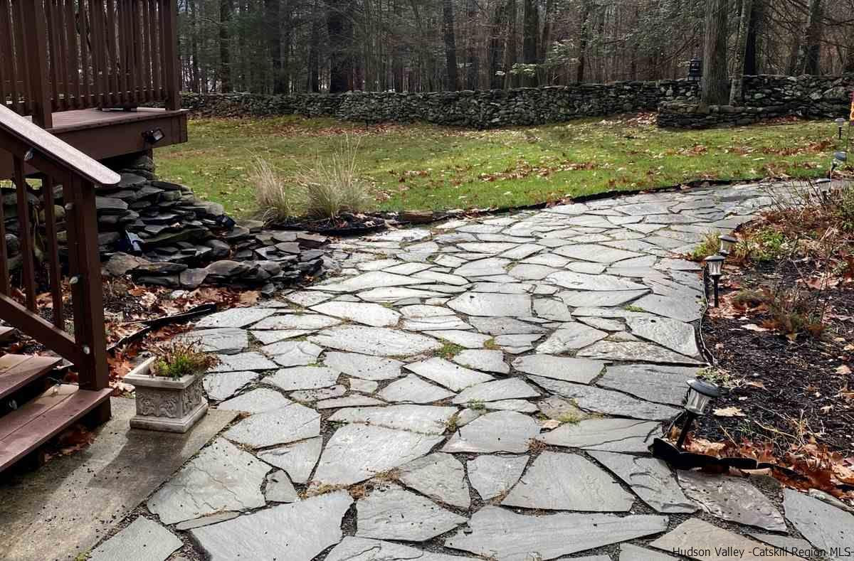 56 Ridge Road Shokan, NY 12481 - Photo 3 of 34 a backyard of a house with lots of green space and trees