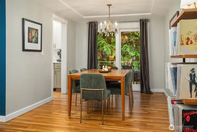 a view of a dining room with furniture window and outside view
