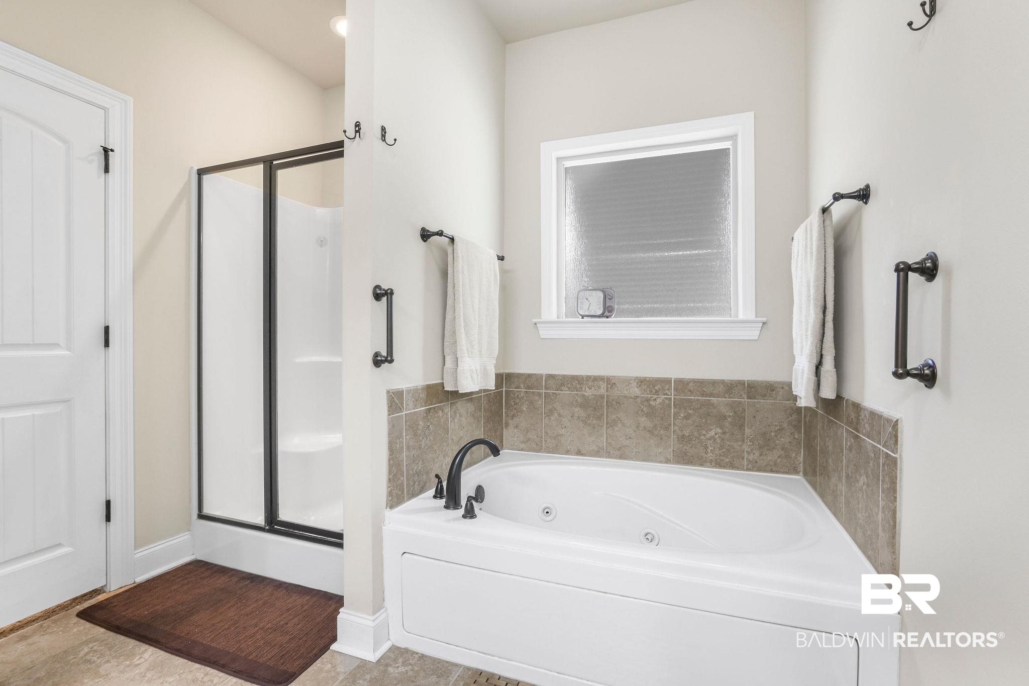 1086 Destin Avenue Foley, AL 36535 - Photo 12 of 30 Bathroom with tile patterned flooring and separate shower and tub