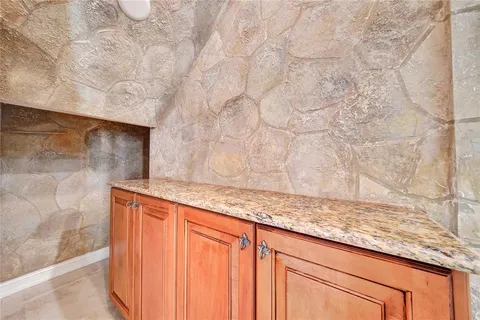 a bath tub sitting next to a window