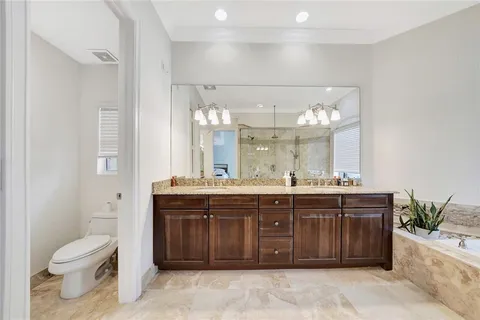 a view of a room with lots of wooden floor and glass door