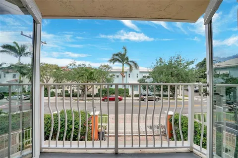 a spacious bedroom with a bed and a view of bedroom