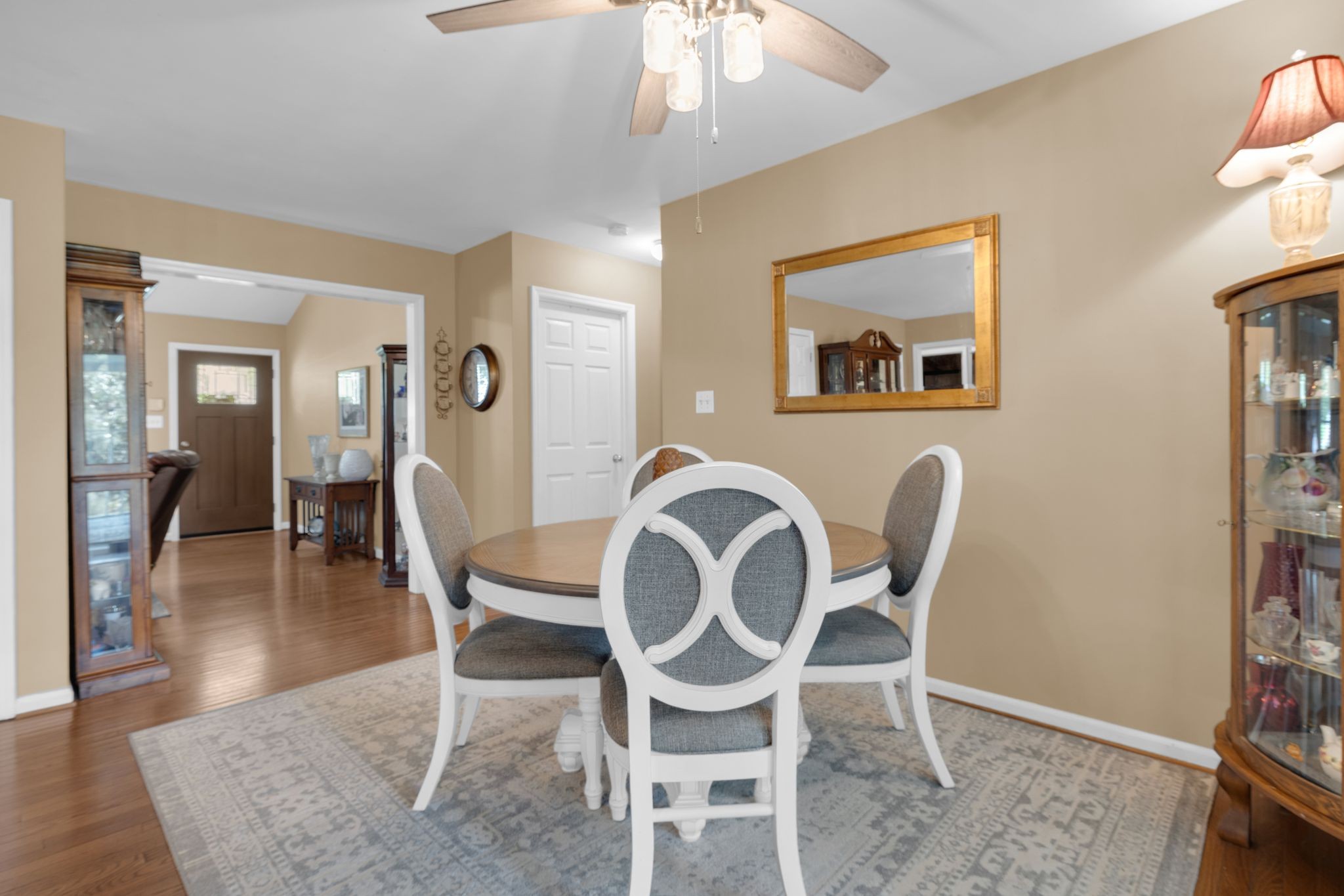 2113 Spring Lake Drive Spring Hill, TN 37174 - Photo 13 of 27 a view of a dining room with furniture and wooden floor