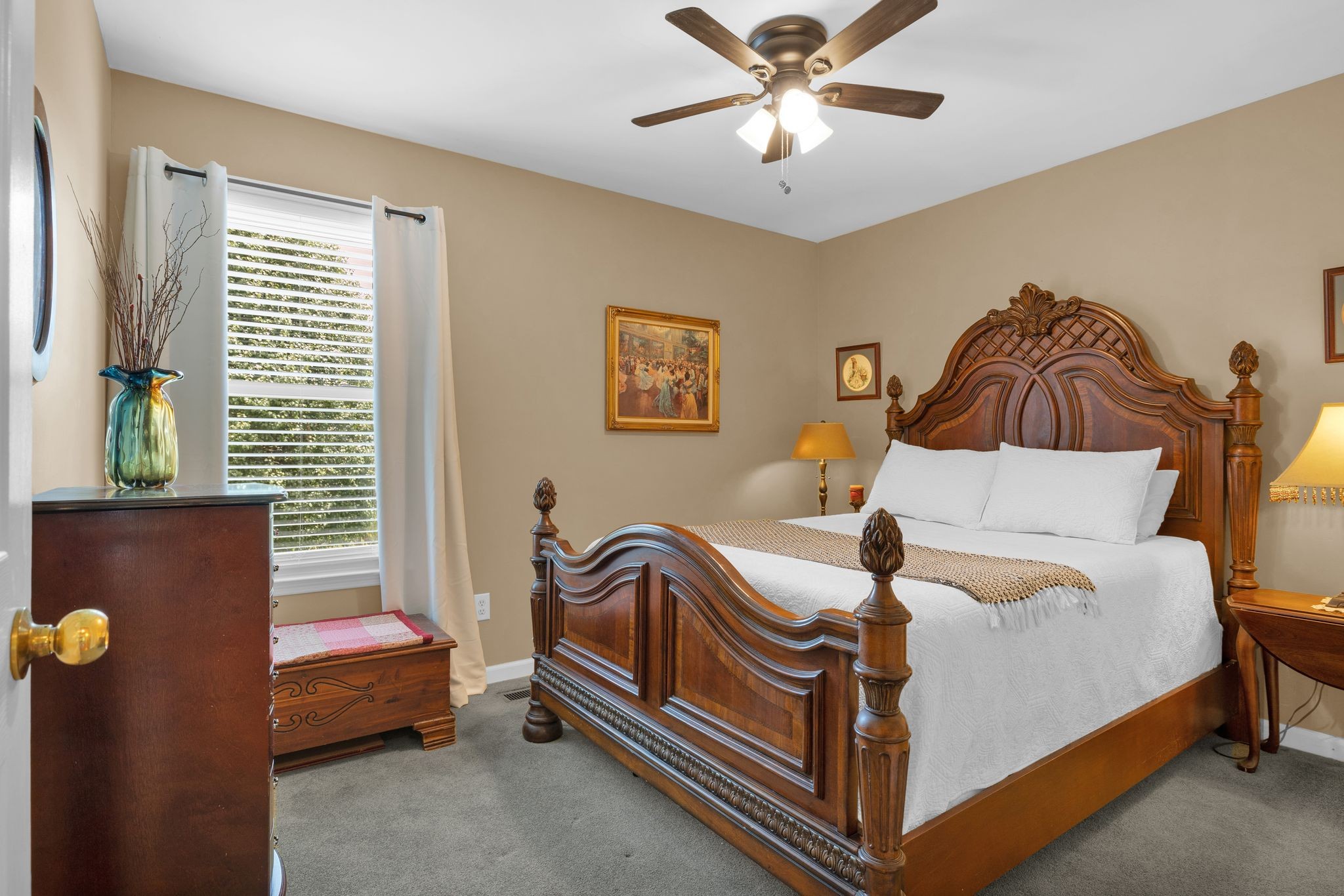 2113 Spring Lake Drive Spring Hill, TN 37174 - Photo 17 of 27 a bedroom with a bed and a chandelier