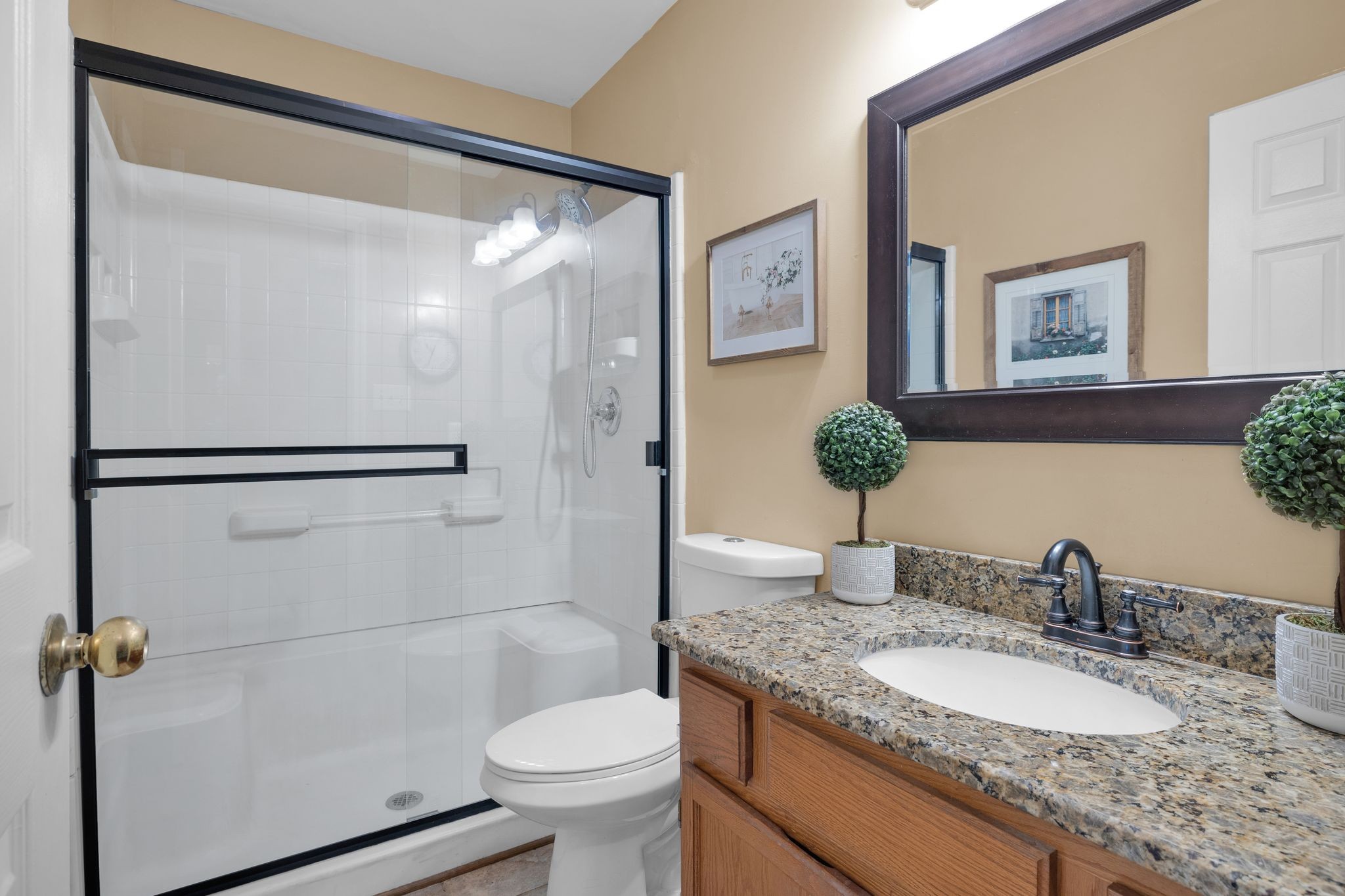 2113 Spring Lake Drive Spring Hill, TN 37174 - Photo 18 of 27 a bathroom with a granite countertop sink toilet and shower